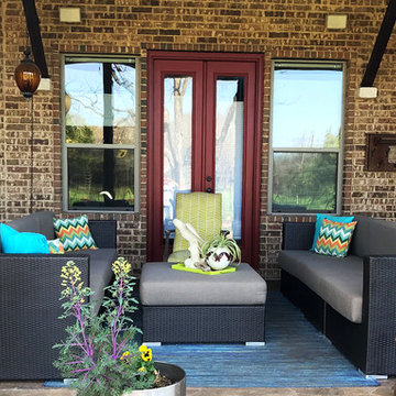 Patio space grounded with neutral Sunbrella Sailcloth Shadow cushions