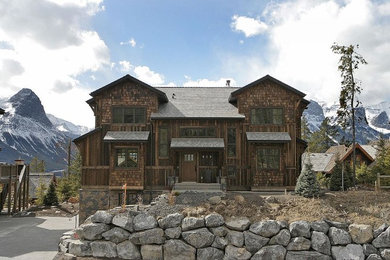 Transitional exterior home idea in Calgary