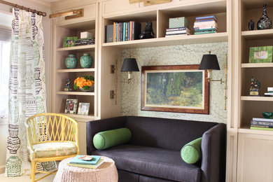 Example of a transitional family room library design in Omaha