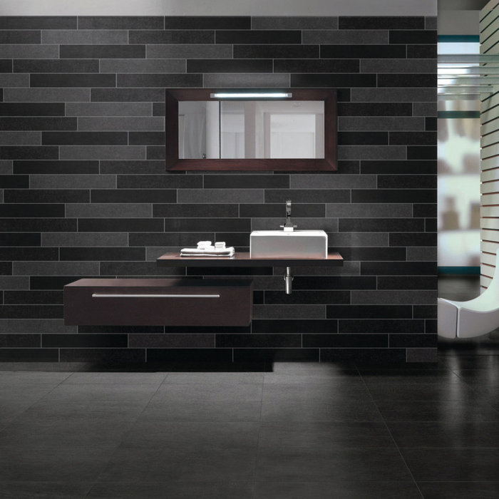 An interior wall and floor tile in an anthracite black which can be mixed and matched in various sizes to create a unique design in your space.