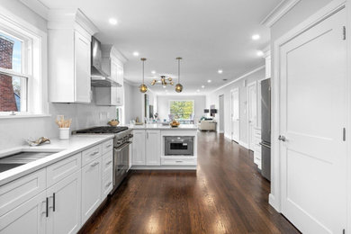 Inspiration for a mid-sized kitchen remodel in Boston with stainless steel appliances