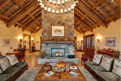 Living room - traditional living room idea in Denver with yellow walls