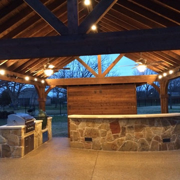 Outdoor Kitchen & Curved Stone Bar