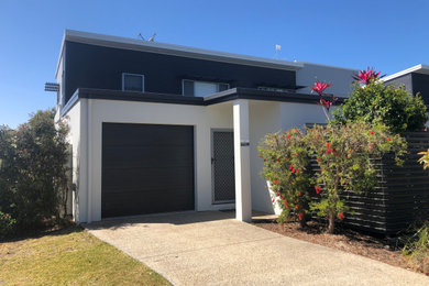 This is an example of a large modern exterior in Sunshine Coast.