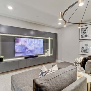 Transitional carpeted and gray floor home theater photo in Orange County with gray walls