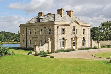Large classic house exterior in Other with three floors.