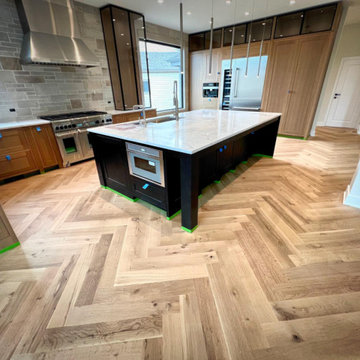 HERRINGBONE HARDWOOD FLOOR PROJECT IN LAKE IN THE HILLS, ILLINOIS.