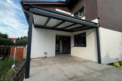 Arona Terrassenüberdachung mit VSG-Verglasung und Aufglas-Markise