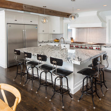 Weathered Antique Beam Accent in an All White Contemporary Kitchen