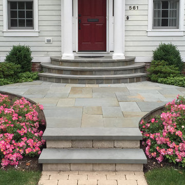 Traditional House with Contemporary Hardscape