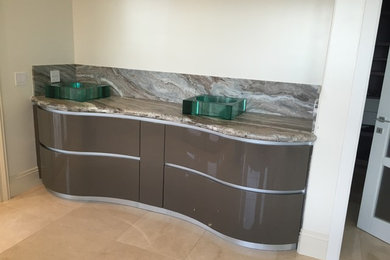 Bathroom - mid-sized modern gray tile and stone slab bathroom idea in San Francisco with granite countertops