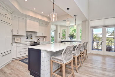 Example of a beach style kitchen design in Tampa
