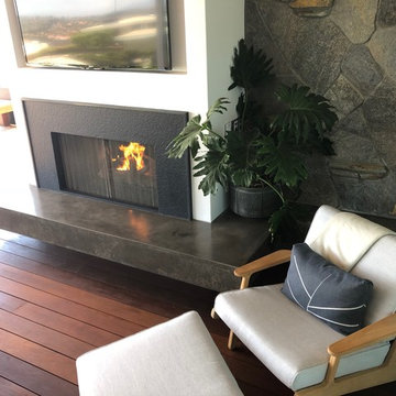 Concrete floating wrap around hearth