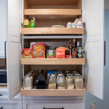 Kitchen with White Perimeter and Blue Island Cabinet Reface