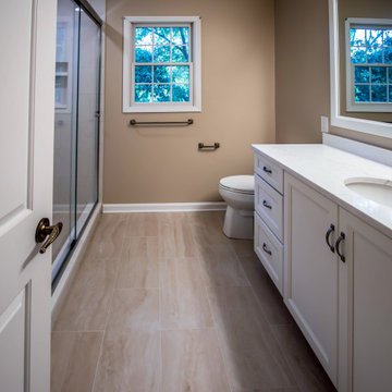 Timeless White Vanity Paired with Luxury Tiled Shower