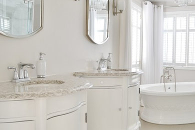 Elegant master gray tile and ceramic tile ceramic tile bathroom photo in Ottawa with furniture-like cabinets, white cabinets, a one-piece toilet, gray walls, an undermount sink and quartzite countertops