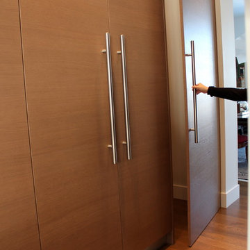 Glass and veneer kitchen in South Calgary
