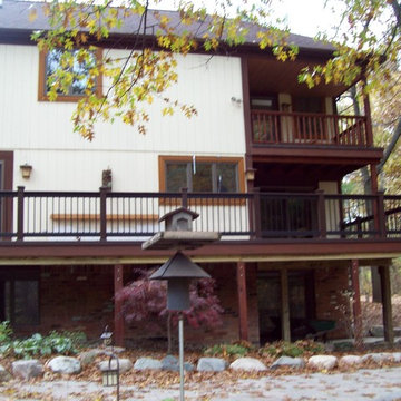 TIMBER TECH DECKING AND INFILL WITH TREX SLEEVES AND FACIA