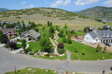 Photo of a large traditional drought-tolerant and full sun hillside landscaping in Salt Lake City.