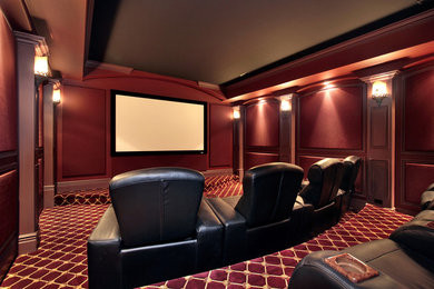 Home theater - contemporary home theater idea in Orlando