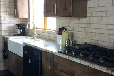 Kitchen - country kitchen idea in Other