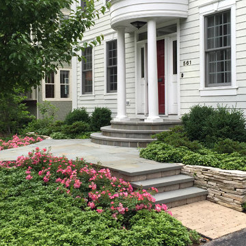 Traditional House with Contemporary Hardscape