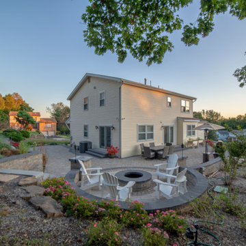 Dual patio with adjoining firepit feature