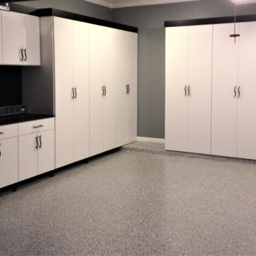 White garage with black trim and designer handles