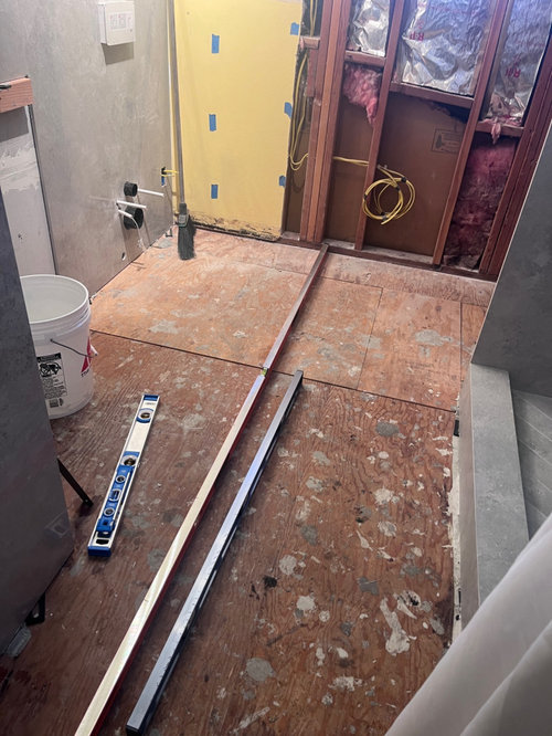 how to install a floating floor with a highpoint at one end