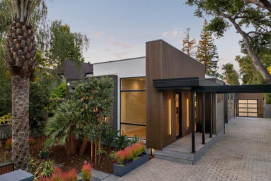 Mid-sized minimalist white two-story stucco and clapboard exterior home photo in San Francisco