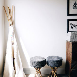 Mid-sized danish gender-neutral carpeted and gray floor playroom photo in Los Angeles with white walls