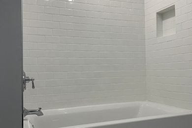 Example of an arts and crafts bathroom design in Boston