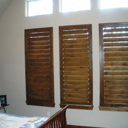 Custom Frame and Custom Color Knotty Alder Shutters - Interior Shutters