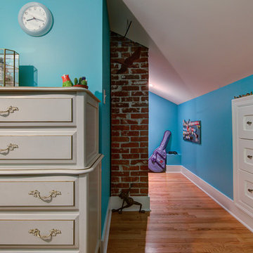 Trendy Attic Development in a 1926 Home