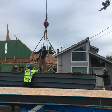 Prepping lift of SIPS panels onto roof