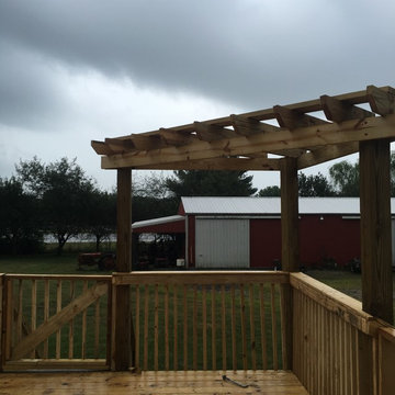 Small deck and decorative pergola; customer request for lattice.