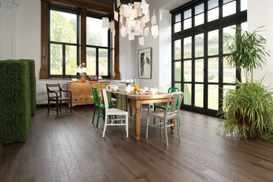 Design ideas for a large traditional kitchen/dining combo in Las Vegas with white walls and medium hardwood floors.