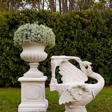 Swan Chair with Bell Urn on Paneled Pedestal