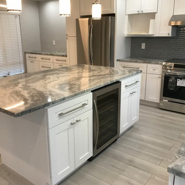 Marble countertops with built in wine fridge