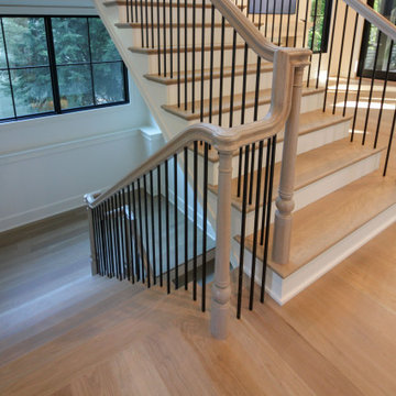 Project #93 | Captivating Staircase with Light Wood and Black Spindles