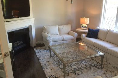Living room - traditional living room idea in Other
