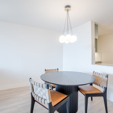 Modern Condo Dining Area with Open Kitchen Pass-Through – North Vancouver Renova