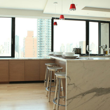 Rift Cut Cabinetry with Waterfall Countertop in Contemporary Manhattan Apartment