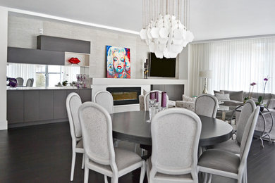 Example of a minimalist dining room design in Montreal
