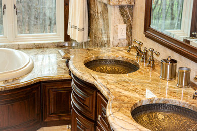 Inspiration for a transitional bathroom remodel in Other with granite countertops