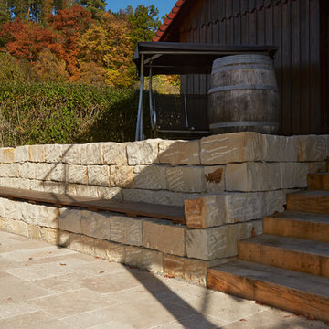 Umgestaltung eines Landhaus Gartens mit mediterranem Charakter