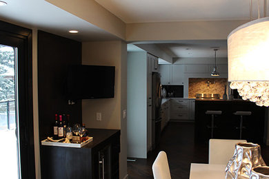 Dining room - modern dining room idea in Calgary