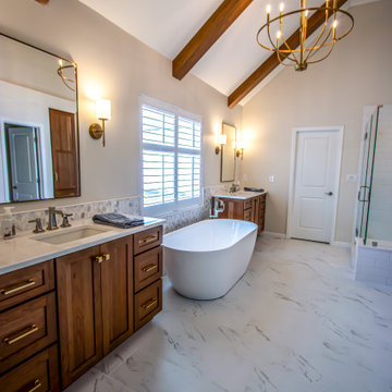 Luxury Spa Bathroom with Natural Warm Vanities, Quartz Countertop, Tiled Shower