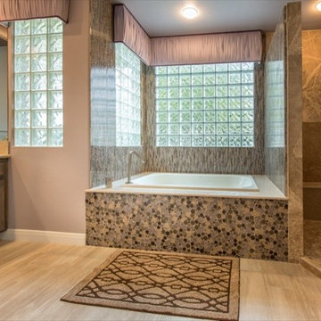 The enlarged shower angles prettily into the room.
