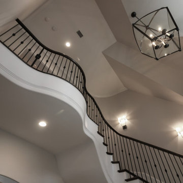 Project #86 | Sweeping Curved Staircase with Iron Balusters